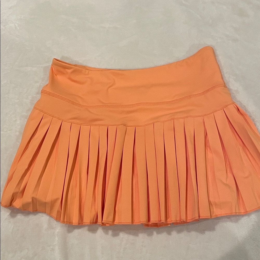 Gold Hinge Pleated Orange Mini Skirt